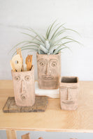 Clay face planters